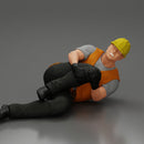 construction worker lying on the floor holding his injured leg - Only-Games