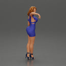 Elegant pose in vibrant blue dress with matching high heels - Only-Games
