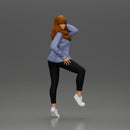 Young woman in  shirt with long hair posing with one foot resting on the motorcycle - Only-Games