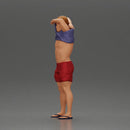 muscular man in shorts taking off his shirt to go swimming - Only-Games