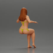 Sexy girl in a bikini sitting on a boat - Only-Games
