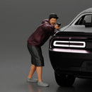 gangster man in a hoodie and cap shooting a gun behind the car - Only-Games