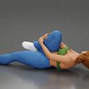 woman in bra lying on the floor touching her injured knee - Only-Games