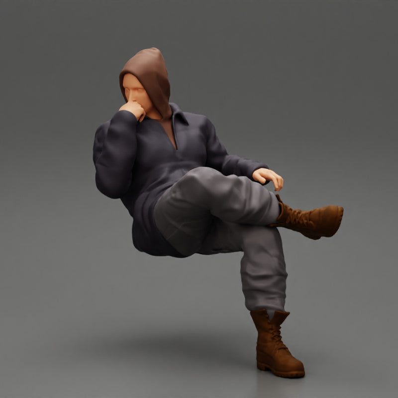 man in leather jacket and jeans sitting cross legged and thinking - Only-Games