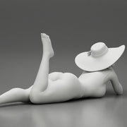 Beautiful Young Sexy Woman Wearing swimsuit  With  Sun Hat Lying Down On The Sand Beach - Only-Games