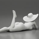 Beautiful Young Sexy Woman Wearing swimsuit  With  Sun Hat Lying Down On The Sand Beach - Only-Games