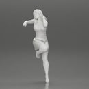 Sexy girl in mini skirt and heels Leaning Against wall - Only-Games