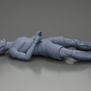 Defeated fighter lying on the floor after the battle - Only-Games