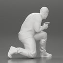 Gangster in pants sitting and holding a gun hides behind the car - Only-Games