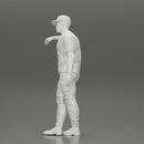 gangster man standing and leaning against the wall in cap - Only-Games