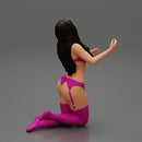 Sexy girl in lingerie bikini with long hair sitting on her knees - Only-Games