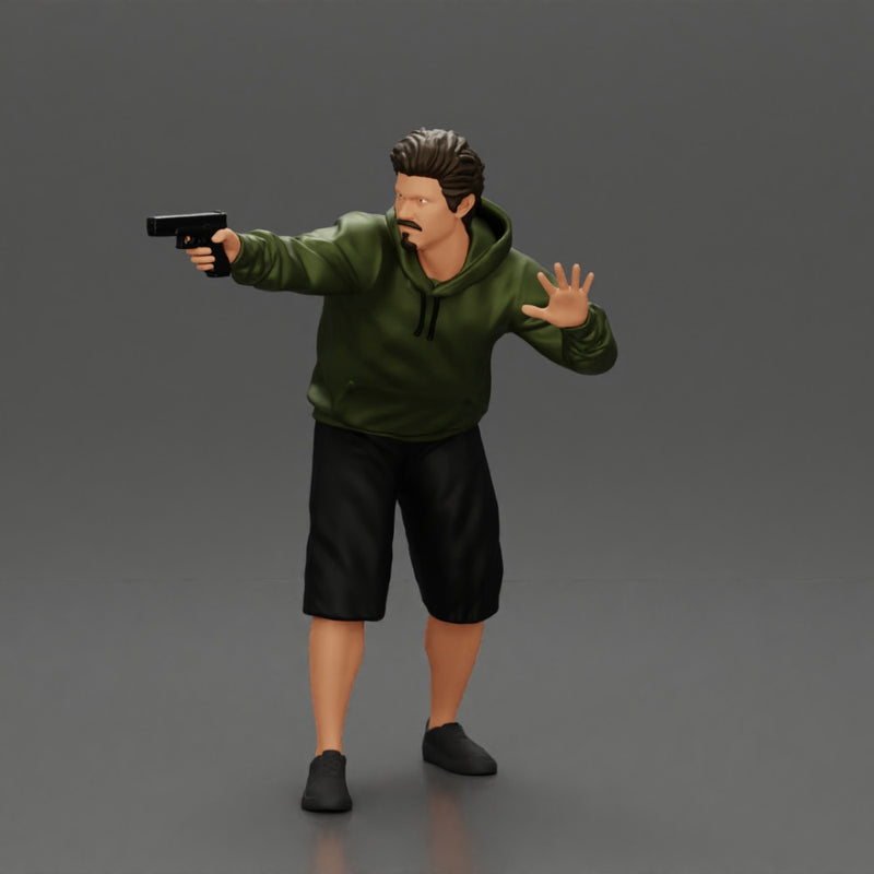 gangster man in a hoodie and shorts shooting a gun behind the car