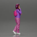 young woman listening to music with headphones and carrying a backpack - Only-Games