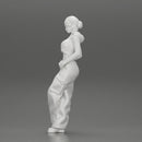 Chola girl Leaning On A Wall While Holding Her Legs Crossed - Only-Games