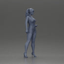 Elegant woman in dress posing confidently with playful charm - Only-Games