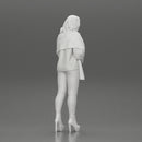 woman in the cold standing wearing a shawl and heels - Only-Games