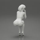 Sexy girl in bikini sitting - Only-Games