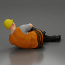 construction worker lying on the floor holding his injured leg - Only-Games