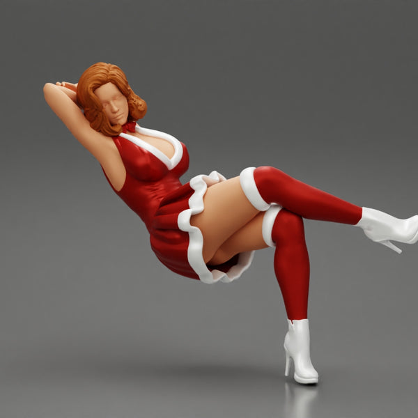 Santa Female sitting in vintage chair