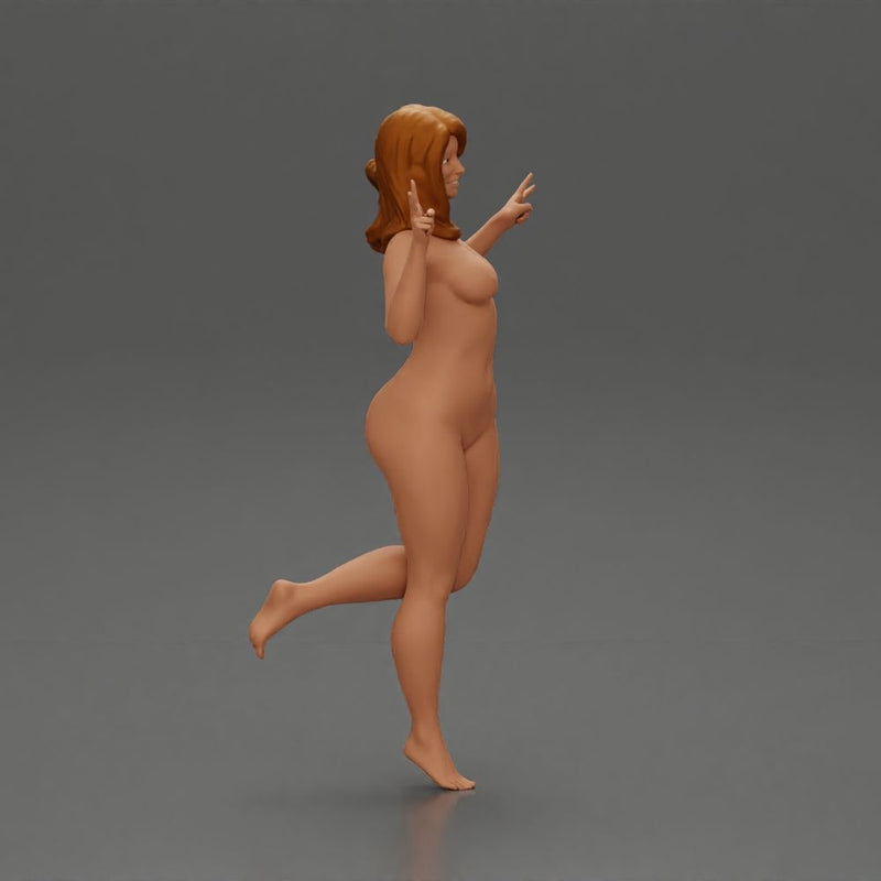 Naked happy girl jumping on one leg