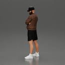 Confident man posing with folded arms, exuding a casual vibe - Only-Games