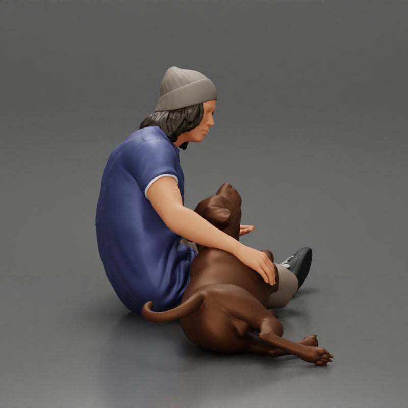 young man in a bonnet sitting crossing his legs and hugging a dog