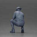 gangster man in shorts and a cap sitting and thinking - Only-Games