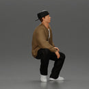 hip hop man sitting in a jacket and cap - Only-Games