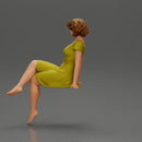 beautiful girl in dress sitting outside with her short hair blowing in the wind - Only-Games