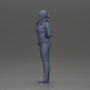 policewoman standing hand resting on her back speaking into a radio with short hair - Only-Games