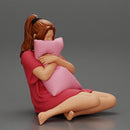 beautiful girl scared sitting and holding a pillow while watching a horror movie on TV - Only-Games