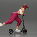 girl in overalls suit and cap riding fast an electric scooter - Only-Games