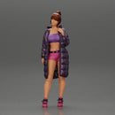 Sexy girl in shorts and long jacket standing - Only-Games