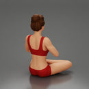 sexy girl in shorts doing sukhasana yoga pose - Only-Games