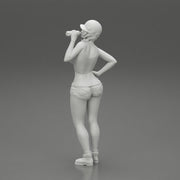 Sexy girl mechanic drinks water during a break - Only-Games