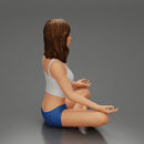 Sexy girl sitting in yoga pose meditation - Only-Games
