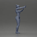 attractive woman in bikini taking a selfie with her phone on the beach - Only-Games