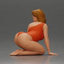 Beautiful Woman in One-Piece Bikini in a Kneeling Pin-Up Pose on the Beach - Only-Games