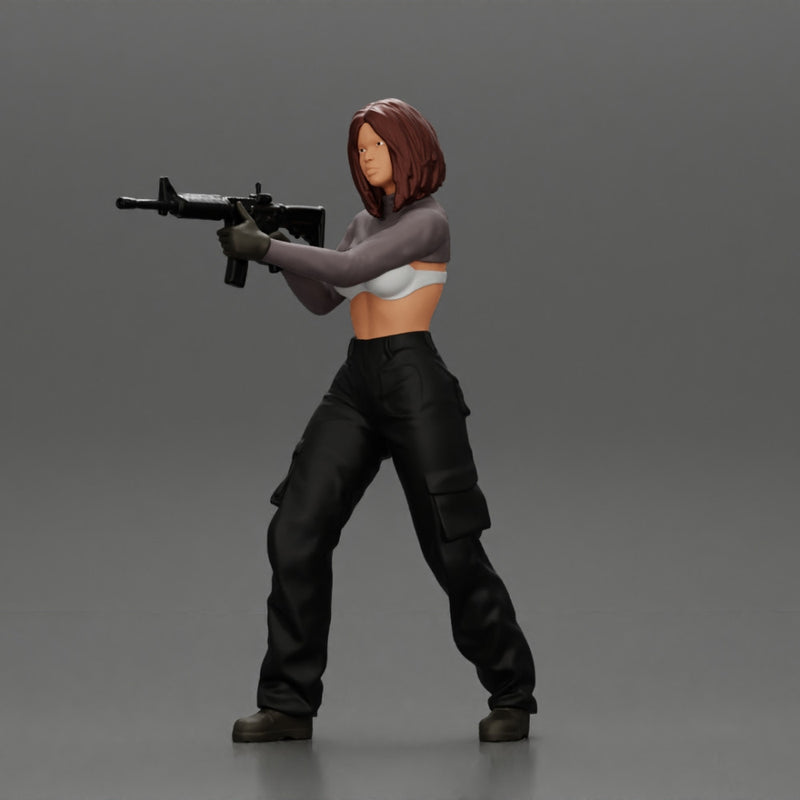 Armed girl going to shoot a gun in a bra with short hair