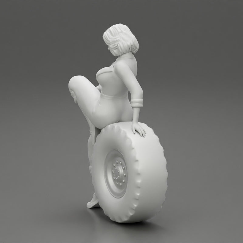 2 Models - Sexy girl mechanic in suit sitting on a truck tyre 2 - Only-Games