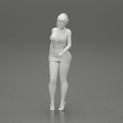 Sexy Girl standing in mini dress on the beach - Only-Games