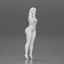 sexy girl in bikini standing smoking cigarette on the beach - Only-Games