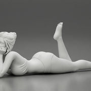 Sexy woman lying in fashionable elegant bikini swimsuit - Only-Games