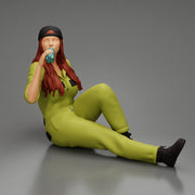 Tired woman mechanic in suit and backwards cap sitting and drinking water during from bottle - Only-Games