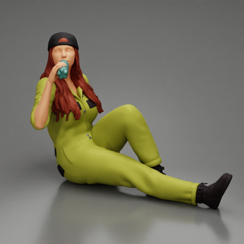 Tired woman mechanic in suit and backwards cap sitting and drinking water during from bottle - Only-Games
