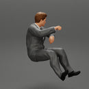 businessman sitting in his car holding steering wheel leaning his left arm on the window - Only-Games