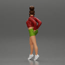 Sexy girl in shorts and an open mini shirt putting her hands in her back pocket - Only-Games