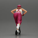 girl in overalls suit and cap riding fast an electric scooter - Only-Games