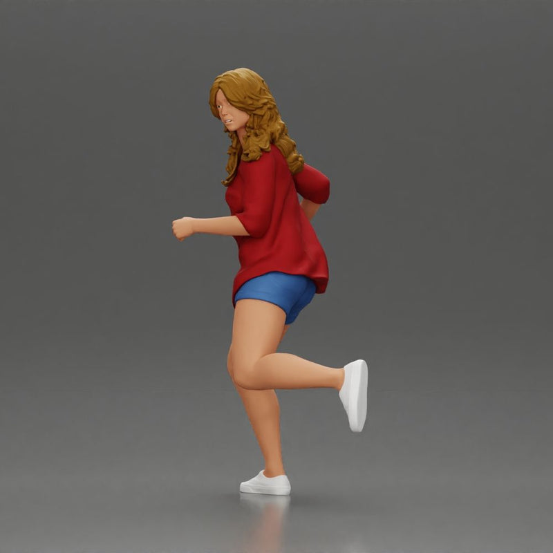 Afraid young woman running in an open shirt and shorts with a determined expression