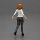 2 Business woman in shirt and trousers pulling suitcase walking in airport terminal - Only-Games